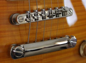 Bridge and tailpiece Bridge and tailpiece