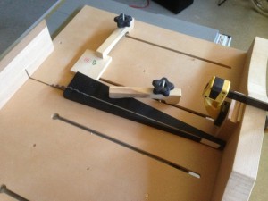 Cross-cut sled with clamped taper jig