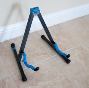 OnStage guitar stand with blue tape OnStage guitar stand with blue tape