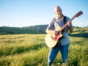 Playing Guitar at Golden Hour