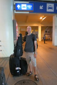 John With Travel Guitar In China