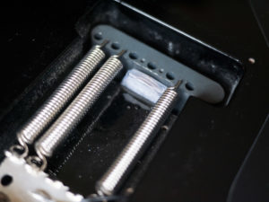 Inserting the tremolo spacer